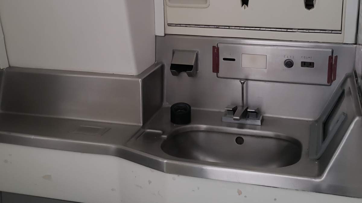 This is the aft lavatory sink. There is running water available in this sink if needed.